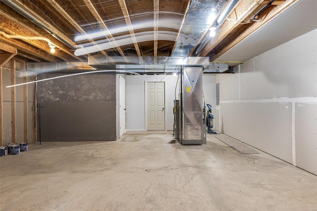 unfinished basement with heating unit