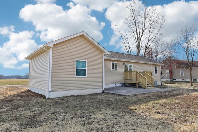 rear view of house with a patio