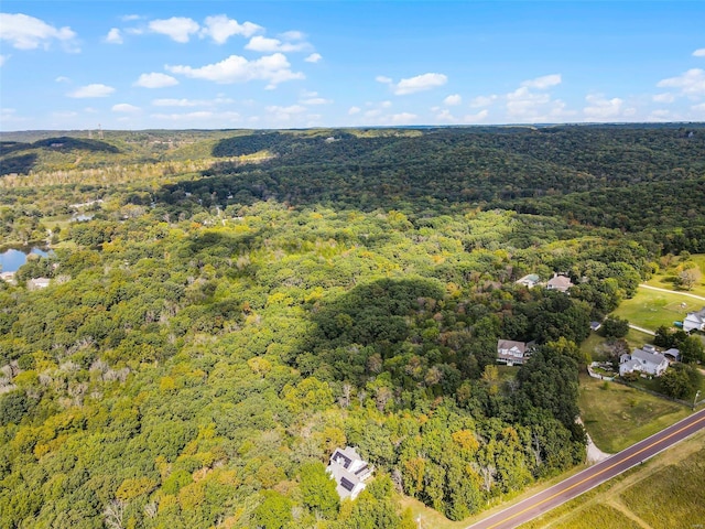 aerial view featuring a view of trees