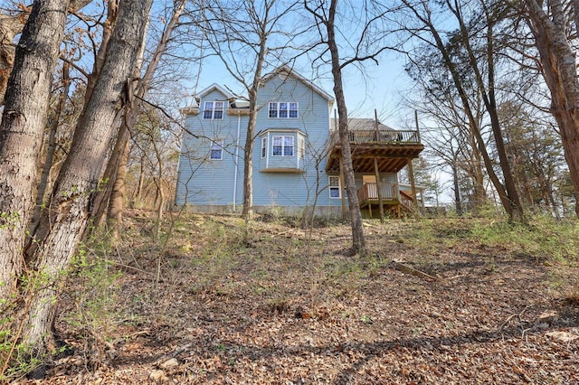 exterior space featuring a wooden deck