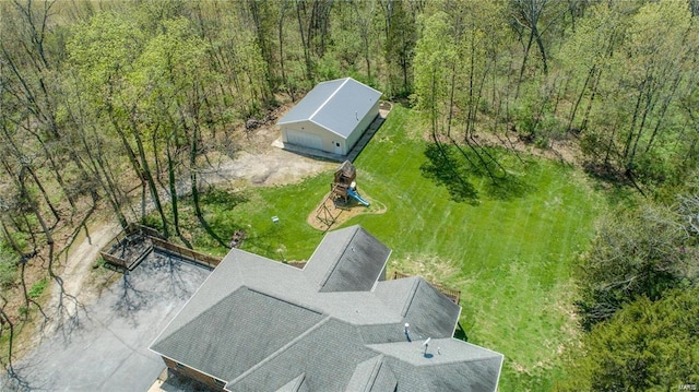 bird's eye view featuring a view of trees