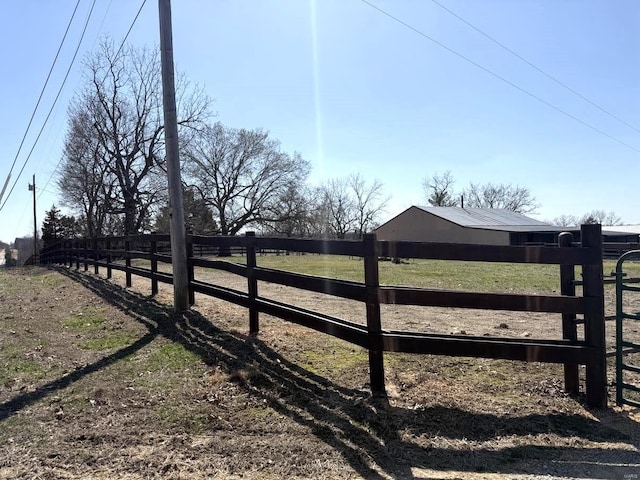view of gate featuring fence