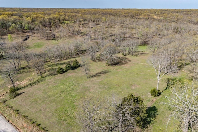 birds eye view of property with a rural view