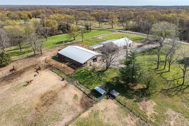 birds eye view of property featuring a rural view
