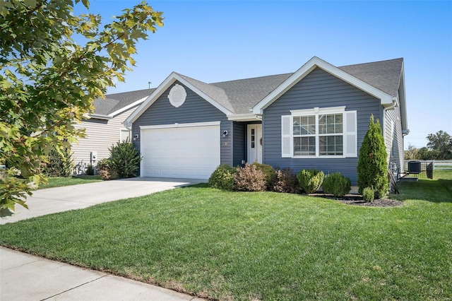 ranch-style home with an attached garage, a shingled roof, driveway, and a front lawn