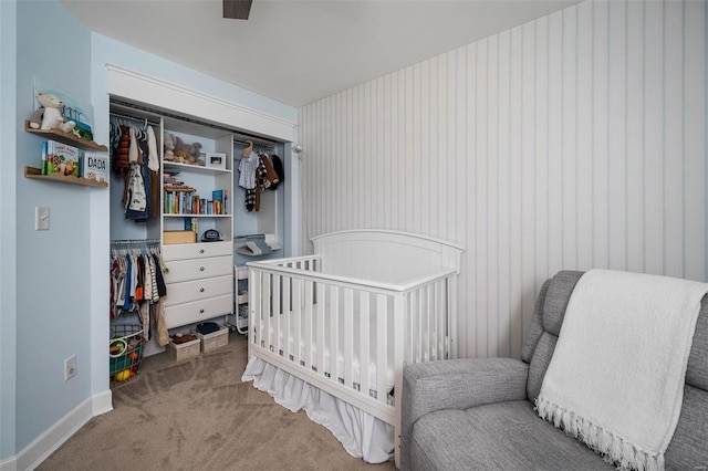 bedroom with a closet and carpet