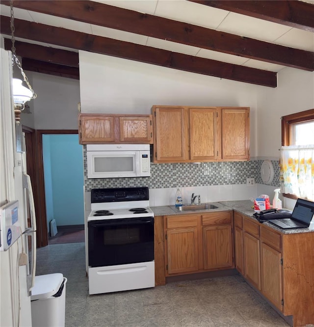 kitchen with a sink, tasteful backsplash, white microwave, and electric range oven