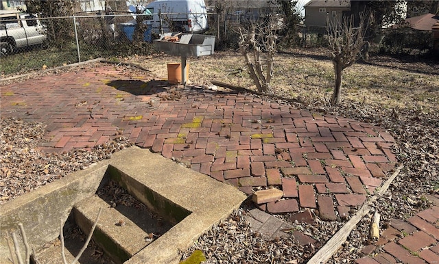 view of patio / terrace with fence