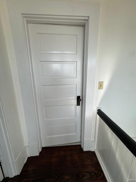 entryway with dark wood-style flooring