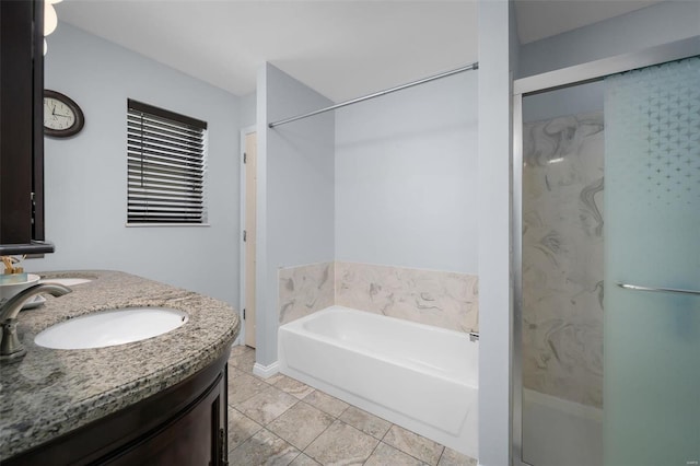 full bathroom featuring tile patterned flooring, double vanity, a stall shower, a bath, and a sink