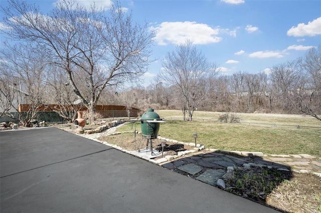 exterior space featuring a patio and fence