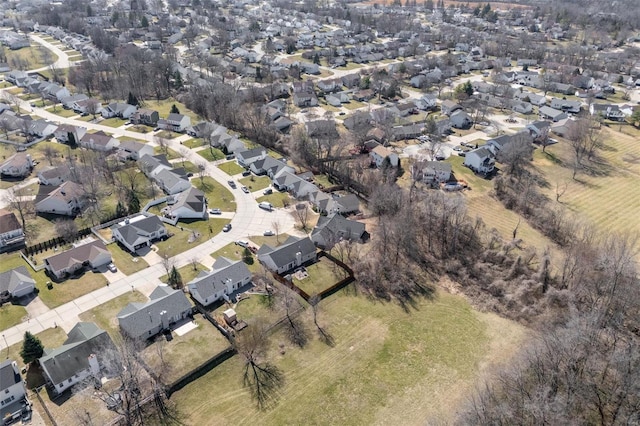 birds eye view of property with a residential view