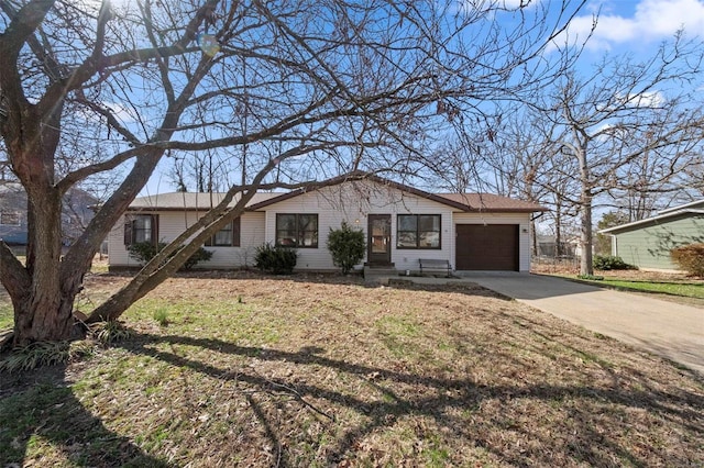 view of front of house featuring a garage and driveway