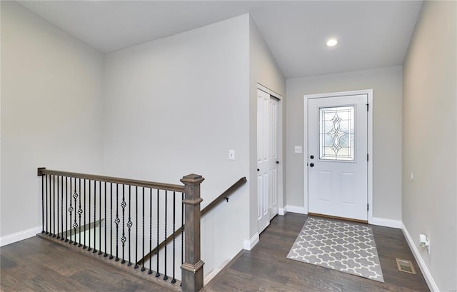 entrance foyer featuring recessed lighting, visible vents, baseboards, and wood finished floors