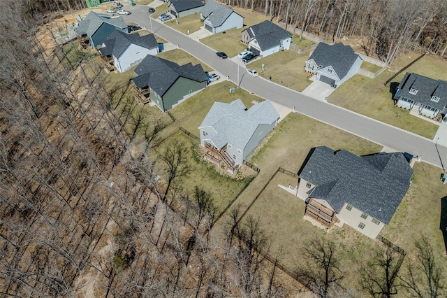 birds eye view of property with a residential view