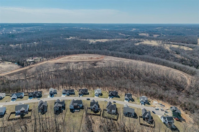 aerial view with a forest view and a residential view