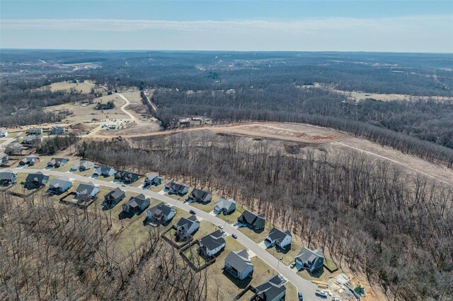 bird's eye view featuring a view of trees