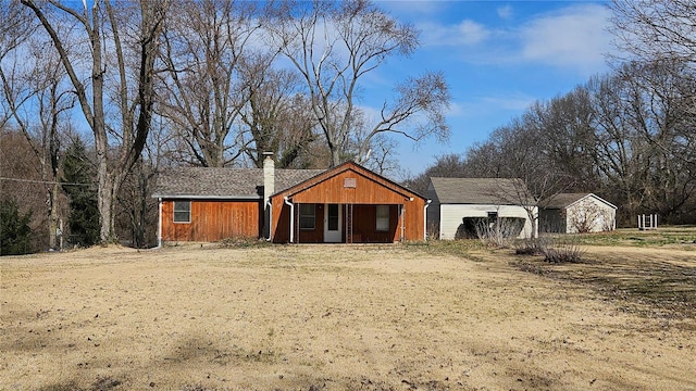 view of front of property with a chimney