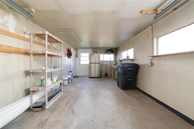 garage with freestanding refrigerator