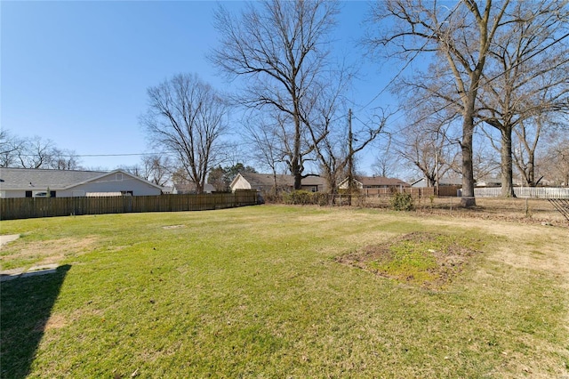 view of yard featuring fence