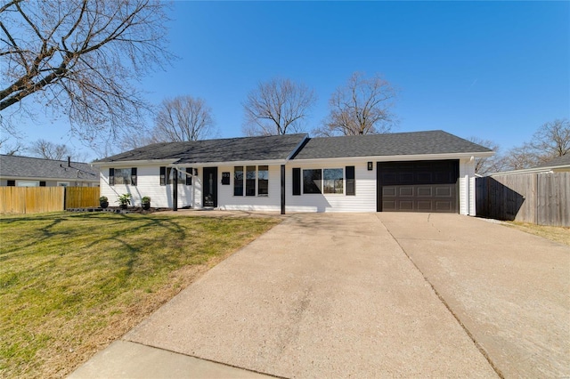 ranch-style home with an attached garage, concrete driveway, a front yard, and fence