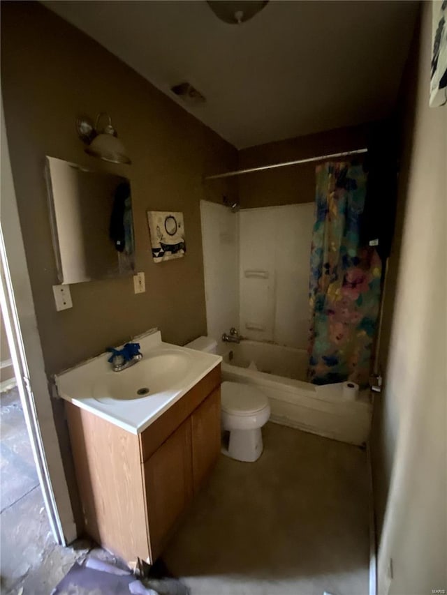 full bathroom featuring toilet, vanity, and shower / tub combo