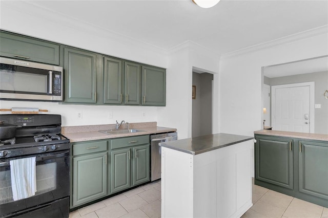 kitchen with ornamental molding, a sink, appliances with stainless steel finishes, light tile patterned flooring, and green cabinetry