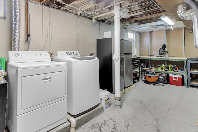 laundry area featuring laundry area and washer and dryer