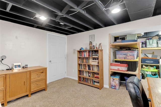 office featuring light colored carpet and baseboards