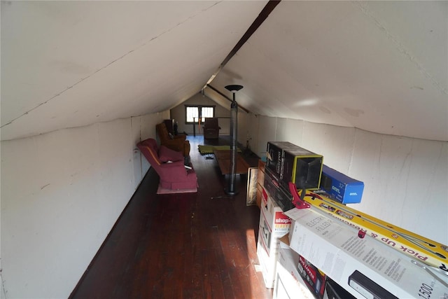 additional living space with lofted ceiling and wood-type flooring