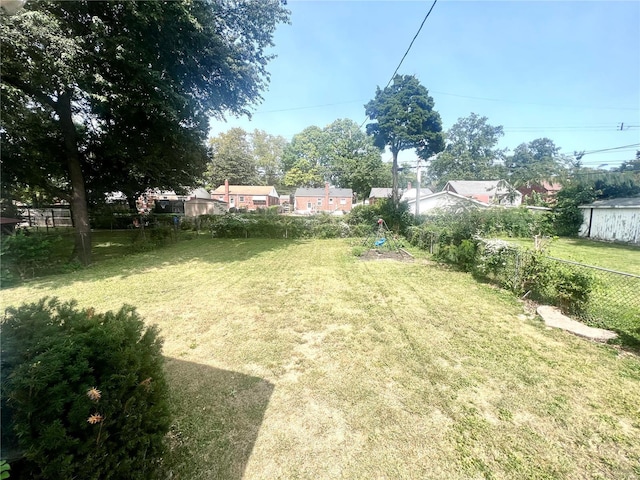 view of yard with fence