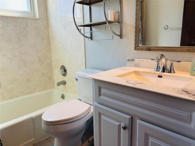 bathroom featuring shower / bathtub combination, toilet, and vanity