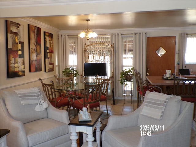 tiled living room featuring a chandelier and crown molding