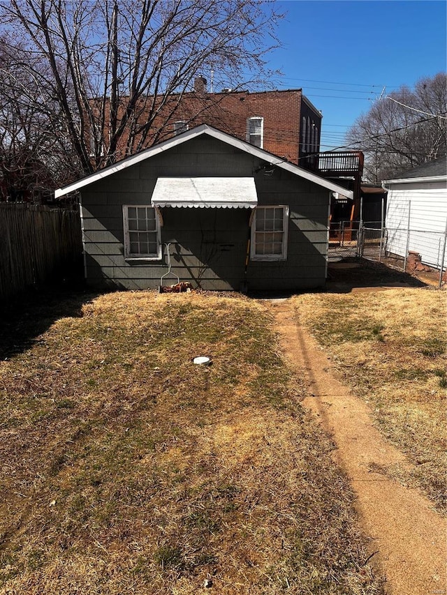 exterior space featuring a yard and fence