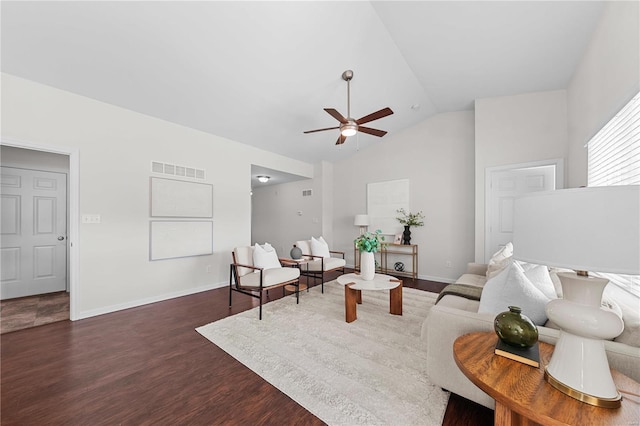 living area with baseboards, visible vents, dark wood finished floors, lofted ceiling, and ceiling fan