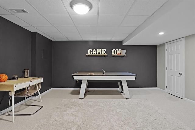 rec room featuring visible vents, baseboards, carpet, and a drop ceiling