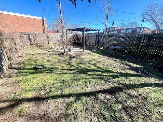 view of yard featuring a fenced backyard