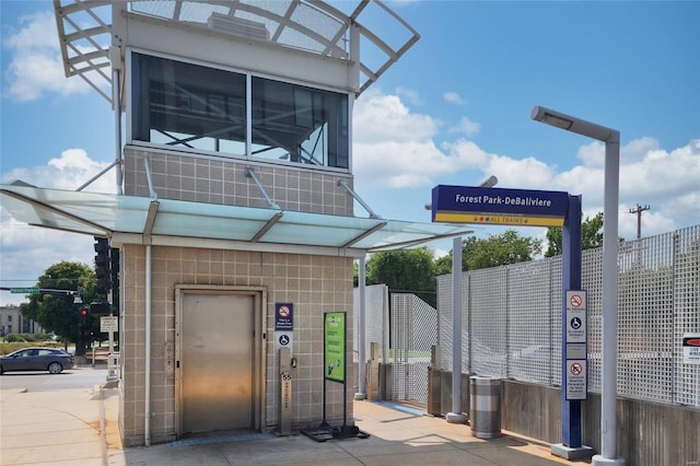 view of property's community featuring a gate