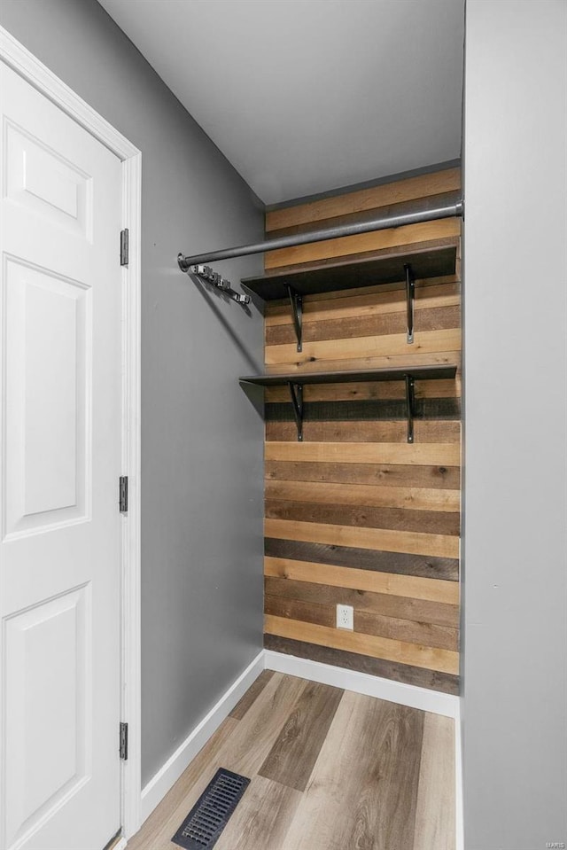 interior space featuring visible vents and wood finished floors