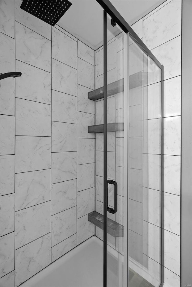 bathroom featuring a stall shower