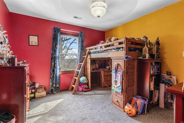 bedroom featuring visible vents and carpet floors