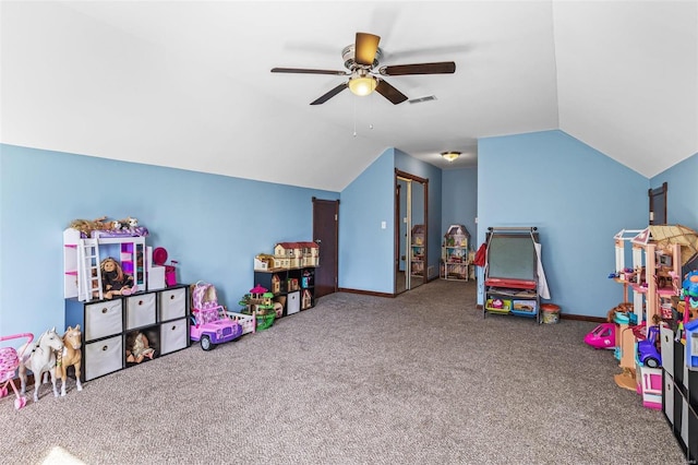 game room featuring visible vents, ceiling fan, baseboards, vaulted ceiling, and carpet flooring