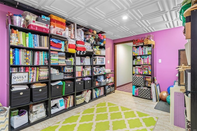 playroom featuring an ornate ceiling