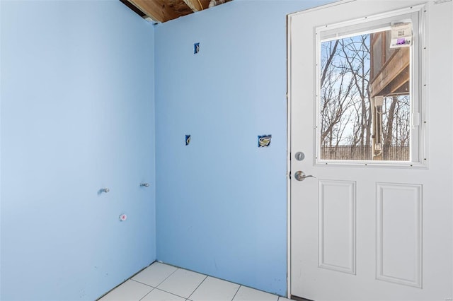 washroom featuring light tile patterned flooring