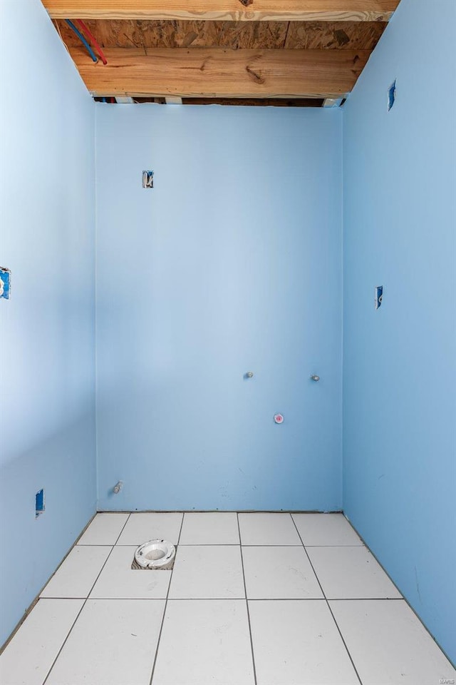 washroom with light tile patterned flooring