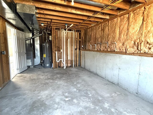 basement with heating unit and water heater