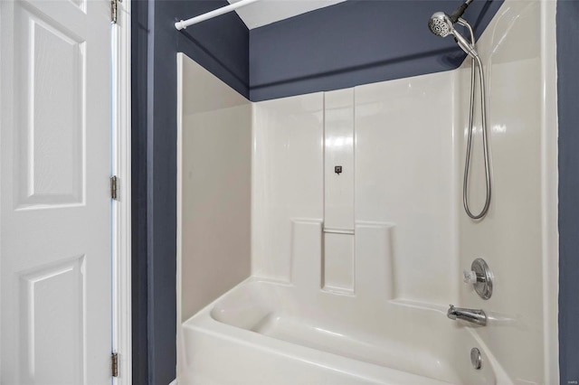 bathroom with washtub / shower combination