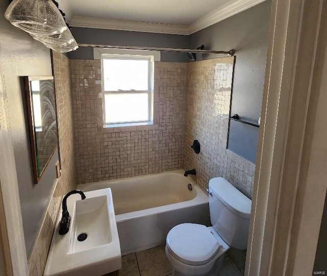 bathroom featuring tile patterned flooring, shower / bathing tub combination, toilet, and ornamental molding