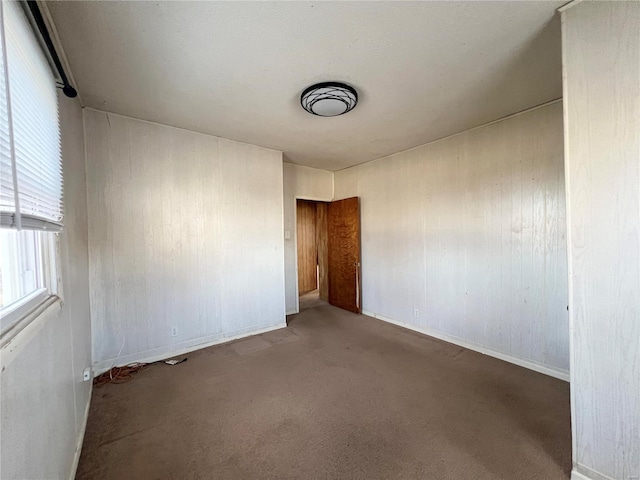 empty room with carpet floors