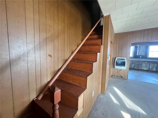 stairway with heating unit and wooden walls